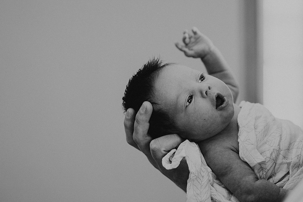 Black and white photo of newborn baby