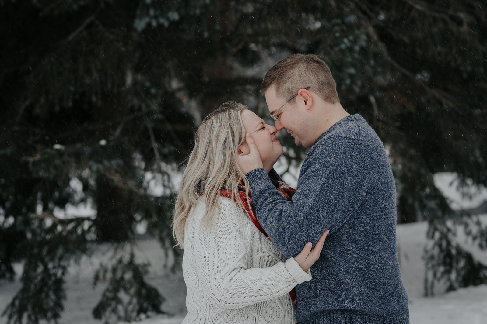 Winter Engagement Session, by Abigail Maki. This blog post includes outfit ideas for an outdoor couples session, and indoor engagement session and posing inspiration. Book your Fargo, ND session session and browse the blog for inspiration #engagement #photography #engagementphotography #fargophotographer